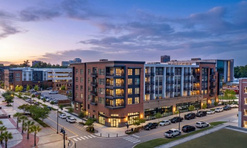 the exterior of a building at sunrise