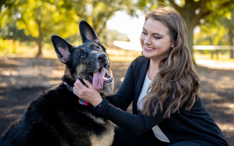 Person with dog at pet park