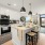 Kitchen and living room with furniture and patio door 