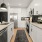 Kitchen with granite counter tops and an island